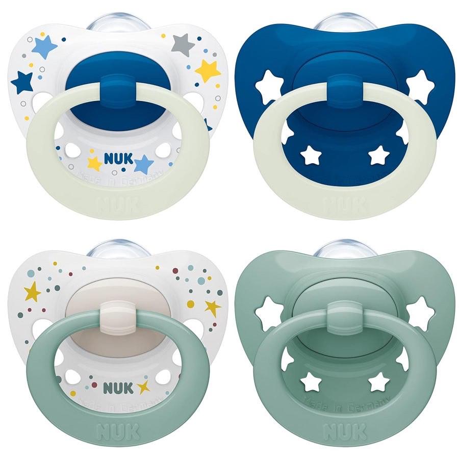NUK Signature Day & Night Babyschnuller | 0-6 Monate | Beruhigt 95 % der Babys | Silikonschnuller in Herzform | Leuchtet im Dunkeln | Sterne | 4 Stück